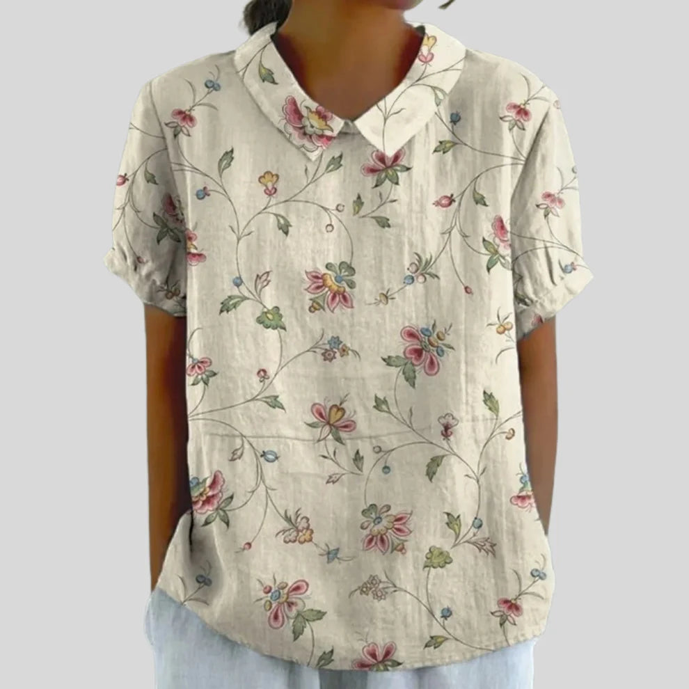 Blusa elegante con diseño floral