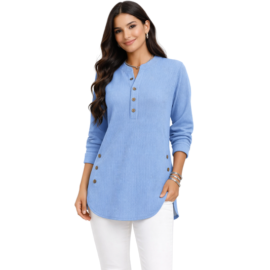 Jersey de manga larga de punto suelto, confeccionada en tejido liso y con cuello redondo